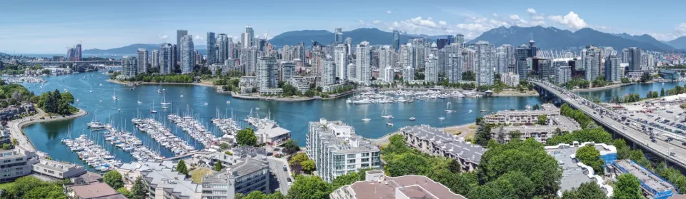 Downtown Vancouver and the North Shore mountains seen across False Creek